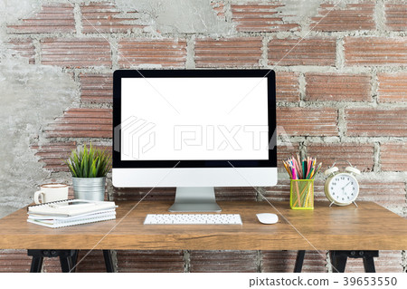 workspace with computer with blank white screen 39653550
