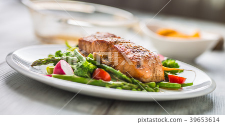 Roasted salmon steak with fresh vegetable. Roasted salmon steak with fresh vegetable. 39653614
