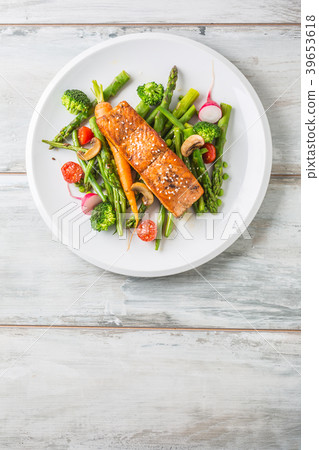 Roasted salmon steak with fresh vegetable. 39653618