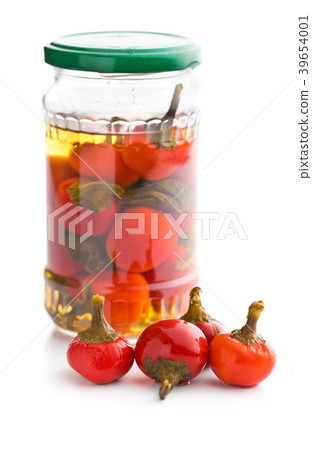 Pickled hot chili peppers. Marinated vegetable. 39654001