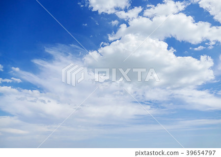 Light clouds against the blue sky. 39654797