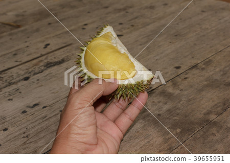 Delicious durian in hand. Delicious durian in hand. 39655951