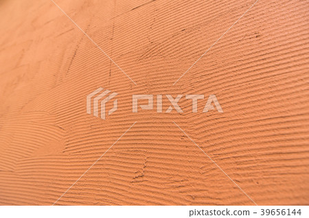 Earthen wall-like comb outer wall texture orange gradation background background 39656144