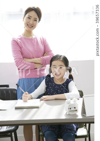 Children studying, mother and daughter 39657336
