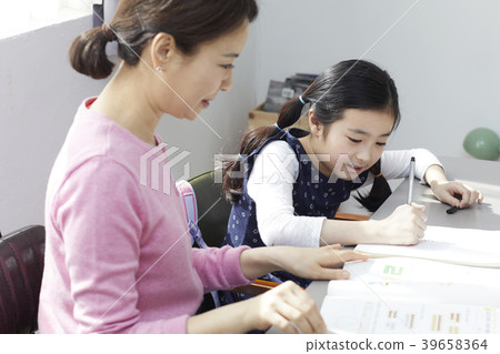 Children studying, mother and daughter 39658364