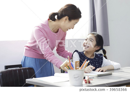 Children studying, mother and daughter 39658366