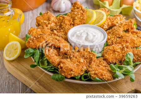 Chicken strips with delish garlic dip Chicken strips with delish garlic dip 39659263