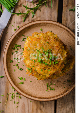Potato pancakes with sour cream Potato pancakes with sour cream 39659513
