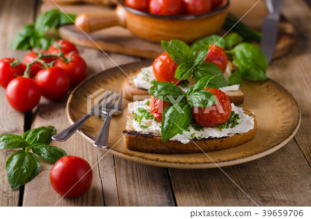 Bread cheese spread baked tomato 39659706