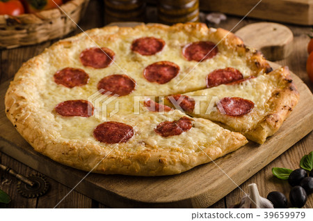 Rustic pizza with tomato, cheese, salami Rustic pizza with tomato, cheese, salami 39659979