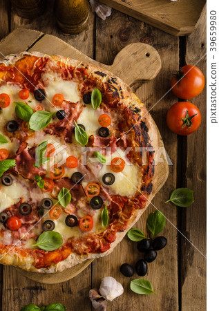 Rustic pizza with tomato, cheese, salami 39659980