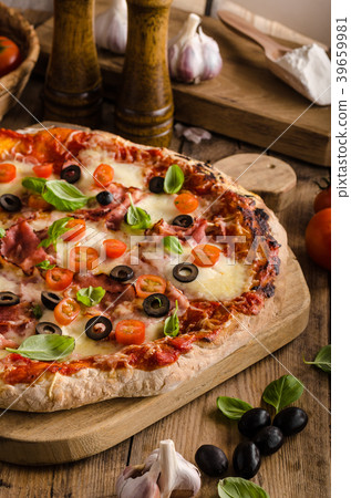 Rustic pizza with tomato, cheese, salami Rustic pizza with tomato, cheese, salami 39659981
