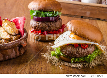 Delicious beef burger with egg Delicious beef burger with egg 39660599