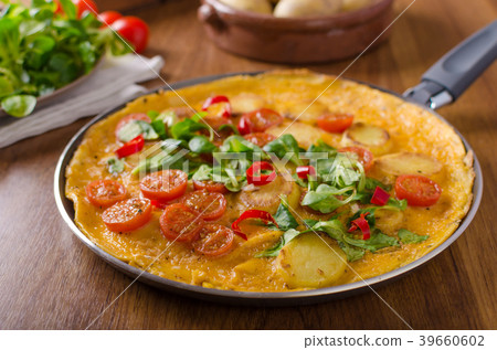 Frittata with tomatoes, herbs and chilli Frittata with tomatoes, herbs and chilli 39660602