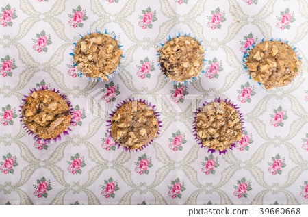 Whole grain muffins with dark chocolate and nuts Whole grain muffins with dark chocolate and nuts 39660668