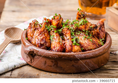 Grilled chicken wings with beer 39660715