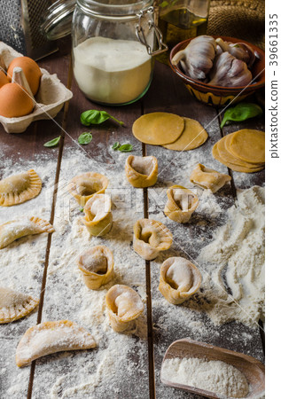 Preparing homemade tortellini Preparing homemade tortellini 39661335