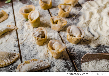 Preparing homemade tortellini 39661336