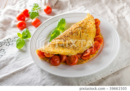 Rustic omelet with tomato Rustic omelet with tomato 39661505