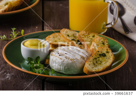 Grilled camembert with toast and juice Grilled camembert with toast and juice 39661637