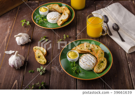 Grilled camembert with toast and juice Grilled camembert with toast and juice 39661639