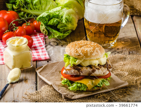 Chicken burger, cold beer Chicken burger, cold beer 39661774