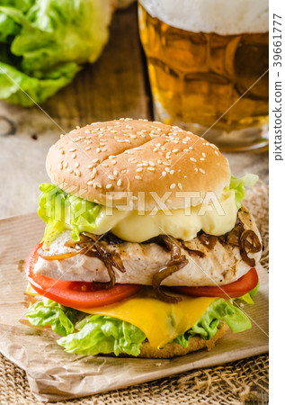Chicken burger, cold beer Chicken burger, cold beer 39661777