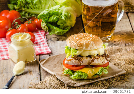 Chicken burger, cold beer Chicken burger, cold beer 39661781