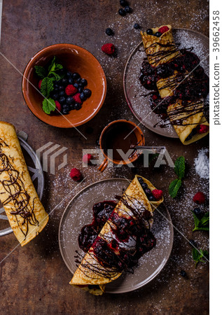 Delicious crepes with forest fruit Delicious crepes with forest fruit 39662458
