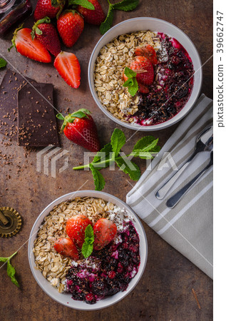 Granola with berries and chocolate Granola with berries and chocolate 39662747