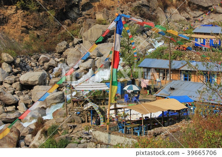 Huts and prayer flags in Bamboo. Huts and prayer flags in Bamboo. 39665706