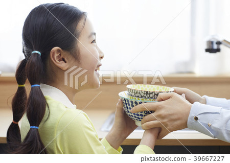 Mother and daughter in the kitchen 39667227