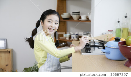 Mother and daughter in the kitchen 39667297