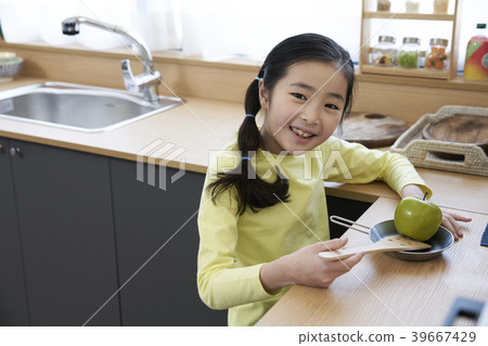 Mother and daughter in the kitchen 39667429