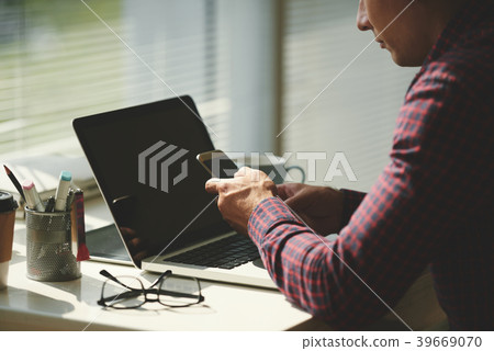 Checking smartphone 39669070