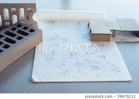 Architect desk with drawing sketches 39670211