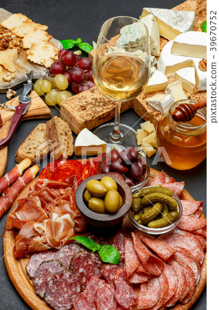 Cold meat cheese plate with salami chorizo sausage Cold meat cheese plate with salami chorizo sausage 39670752