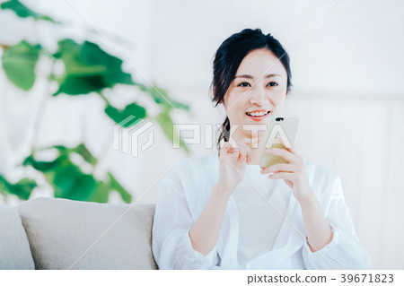 A young lady with a smartphone A young lady with a smartphone 39671823