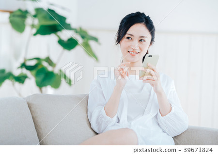 A young lady with a smartphone A young lady with a smartphone 39671824