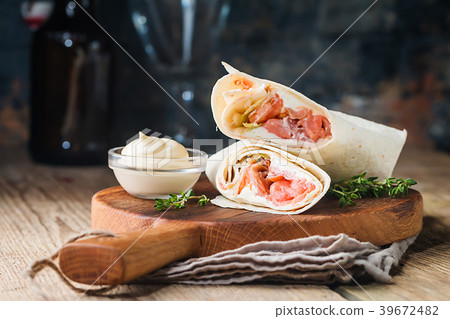 fresh tortilla wrap with salmon 39672482