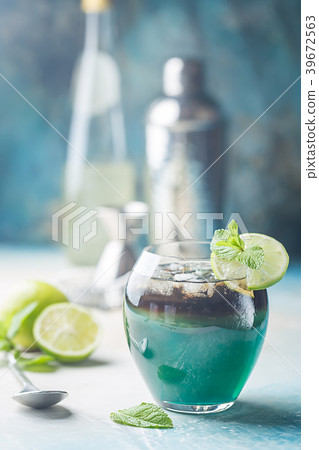 A blue layer alcoholic cocktail 39672563
