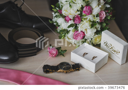 Mens accessories on the table before the wedding Mens accessories on the table before the wedding 39673476