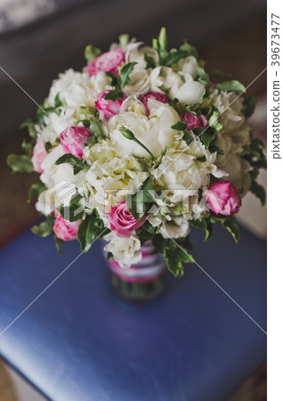 Beautiful bouquet of large white roses greenery Beautiful bouquet of large white roses greenery 39673477