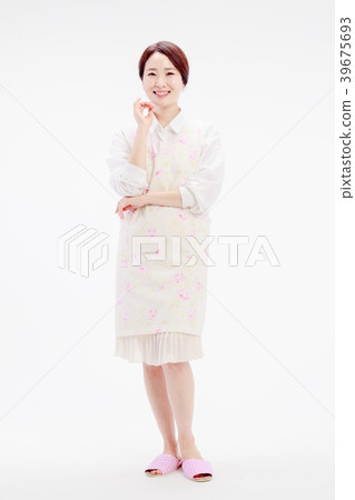 Housewife standing on white background 39675693