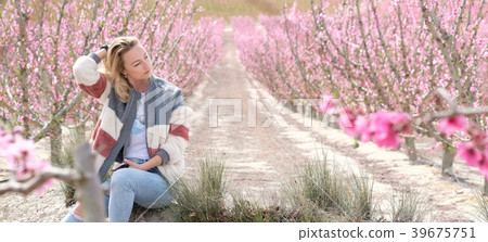 Beautiful woman in a grove Beautiful woman in a grove 39675751