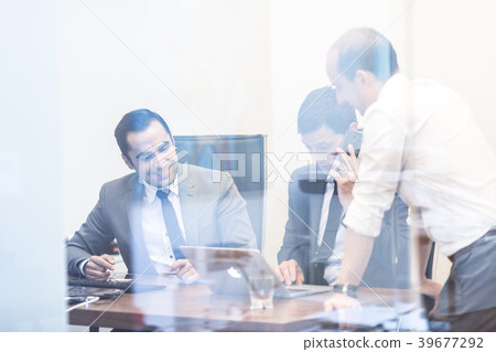 Corporate business team working in modern office. Corporate business team working in modern office. 39677292