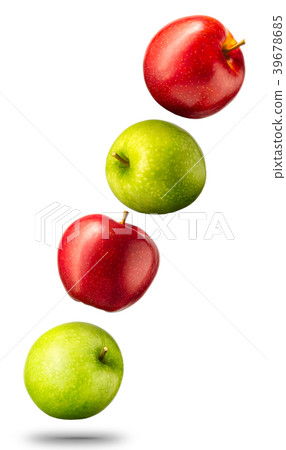 Falling red and green apples on white background Falling red and green apples on white background 39678685