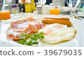 American breakfast with sunny side up eggs,ham,  39679035