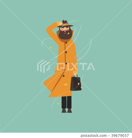 Bearded man in warm orange overcoat and hat on a 39679037