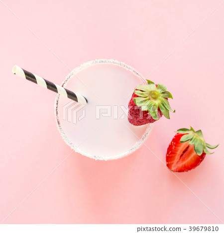 Strawberry milkshake with berry on pink. Close up. 39679810